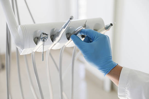 Professional Dental Implants technician working in Yale, OK